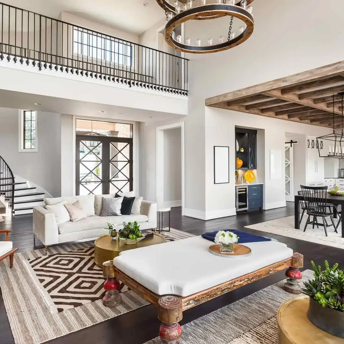 Stunning-Panorama-of-Luxury-Home-Interior-with-Open-Concept-Floor-Plan-Shows-Living-Room-Dining-Room-Kitchen-and-Entry.-Elegant-Stairs-Lead-up-to-Second-Story-shutterstock_1249070089