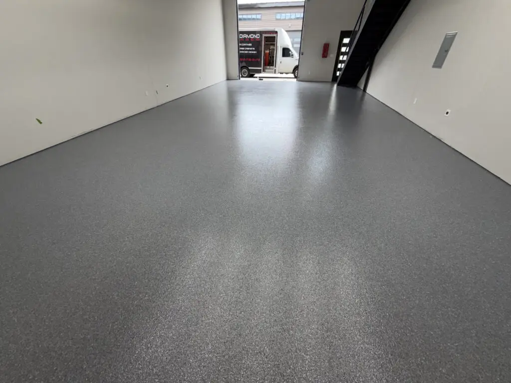 Cota Garages After Epoxy - perfect finish by Black Diamond Garages